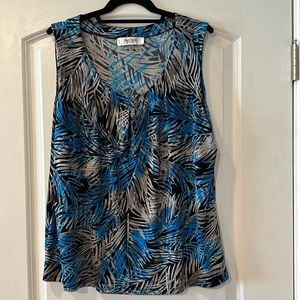 Work sleeveless shirt. Gently worn. Multi colored. Scooped neck.